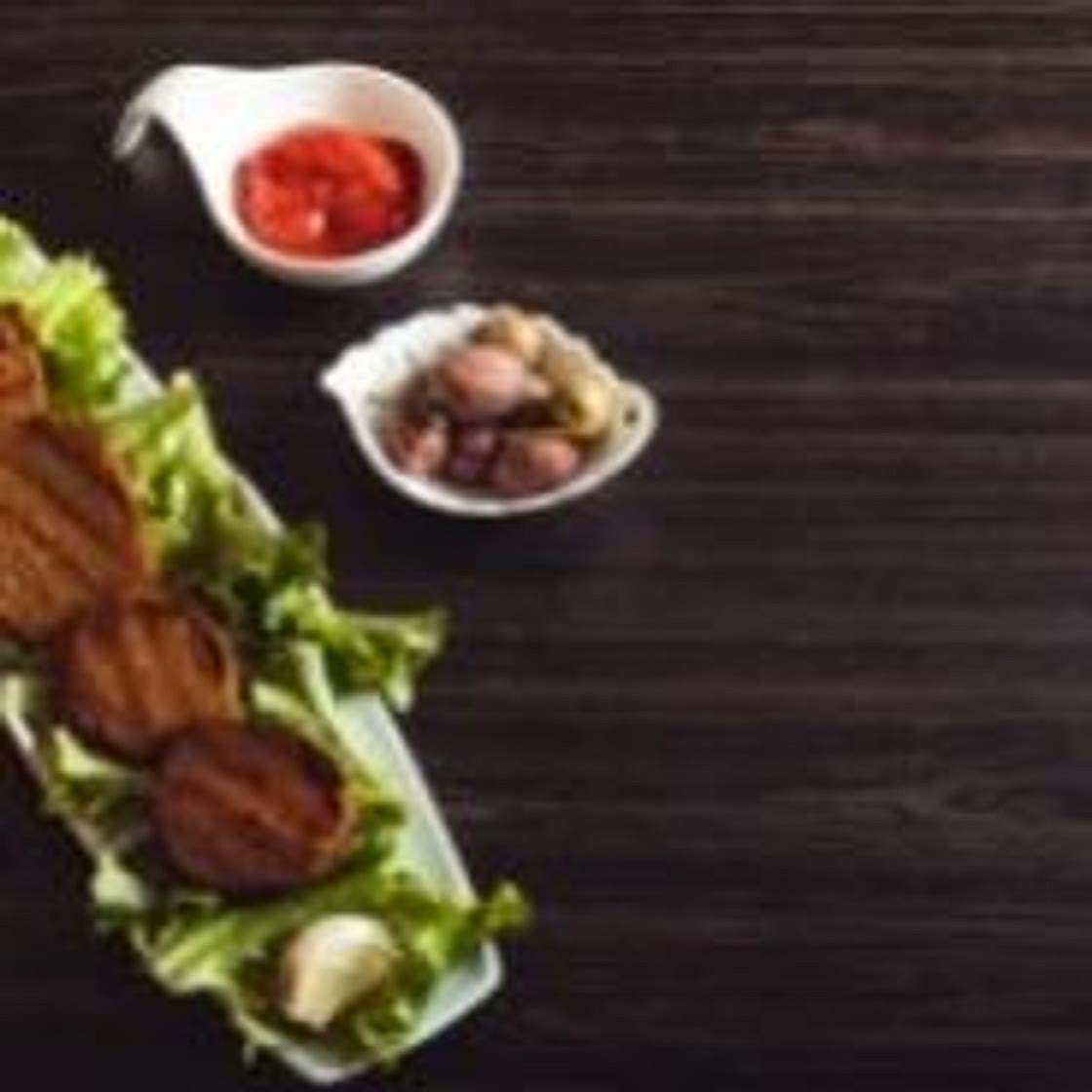 Seitan with onion sauce