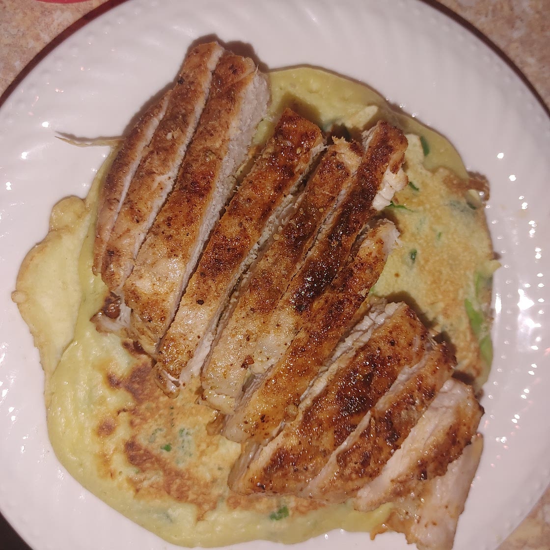Chive pancakes topped with BBQ pork