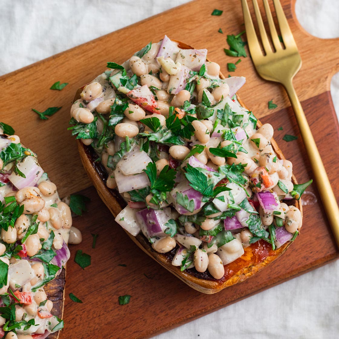Mediterranean White Bean Stuffed Sweet Potato with Tahini