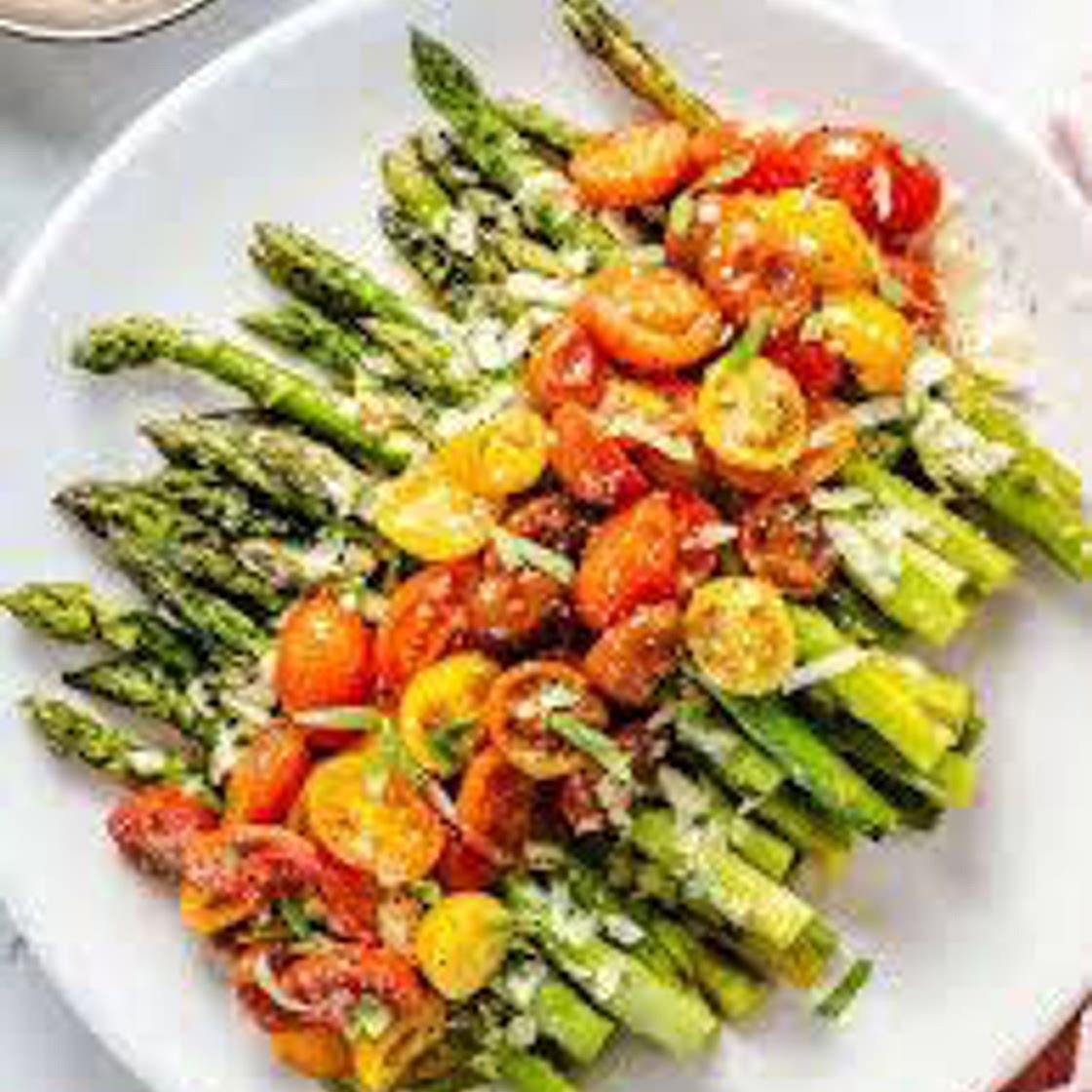 Baked cheesy asparagus with black beans and feta