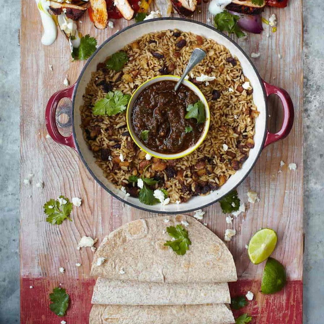 SIZZLING CHICKEN FAJITAS GRILLED PEPPERS, SALSA, RICE & BEAN