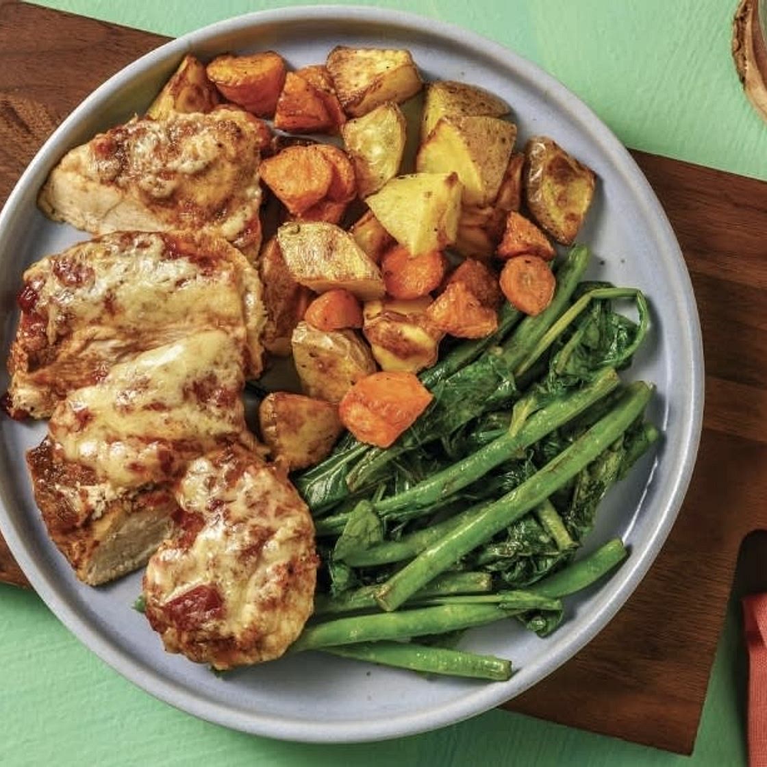Pizza Chicken with garlic butter beand and roast vegetables