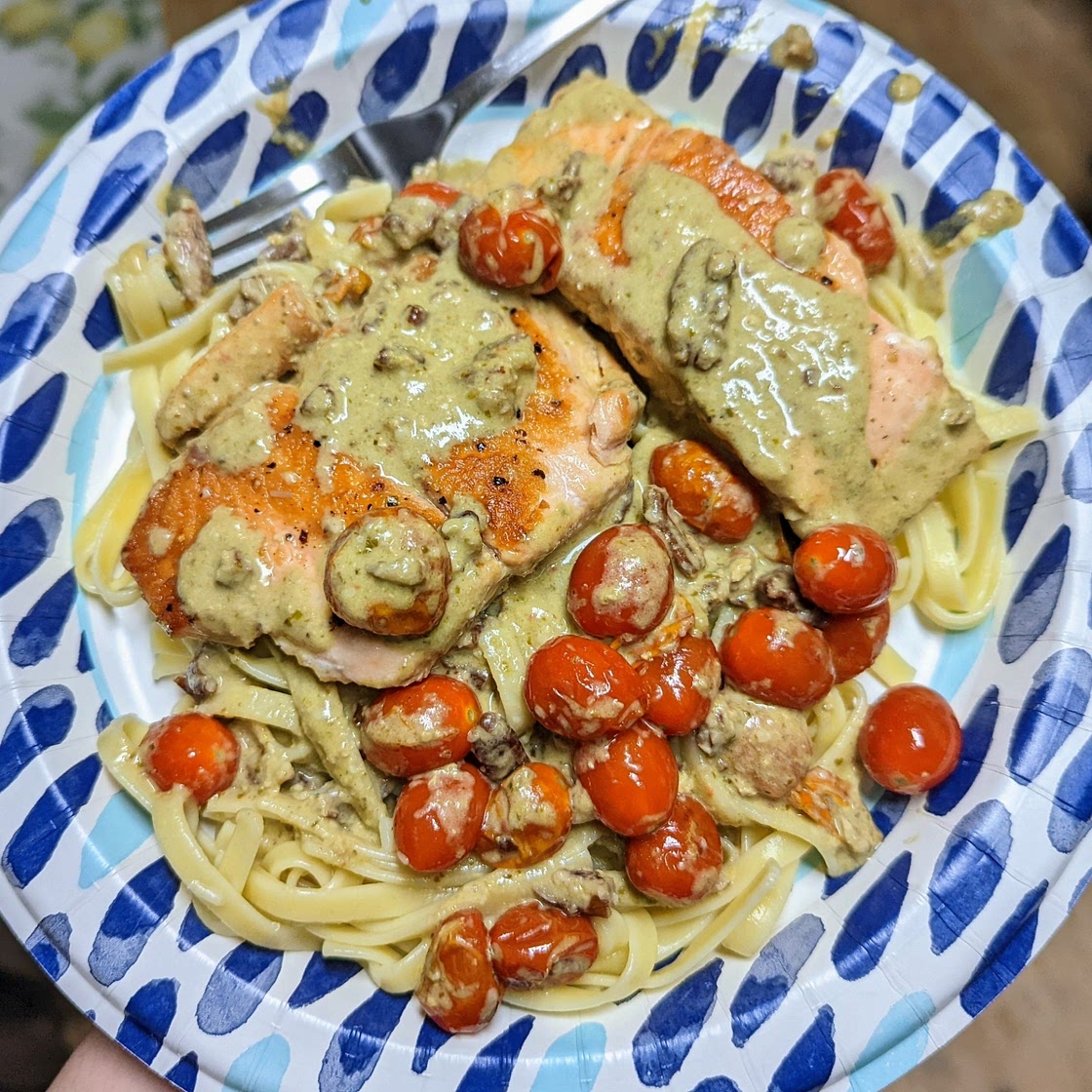 Creamy Pesto Salmon with Roasted Tomatoes and Pecans