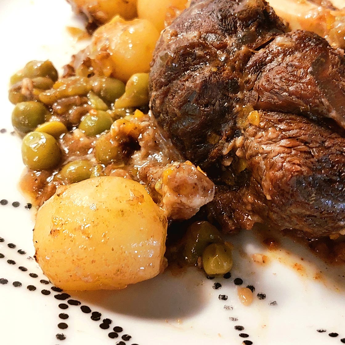 Ossobuco with peas and potatoes