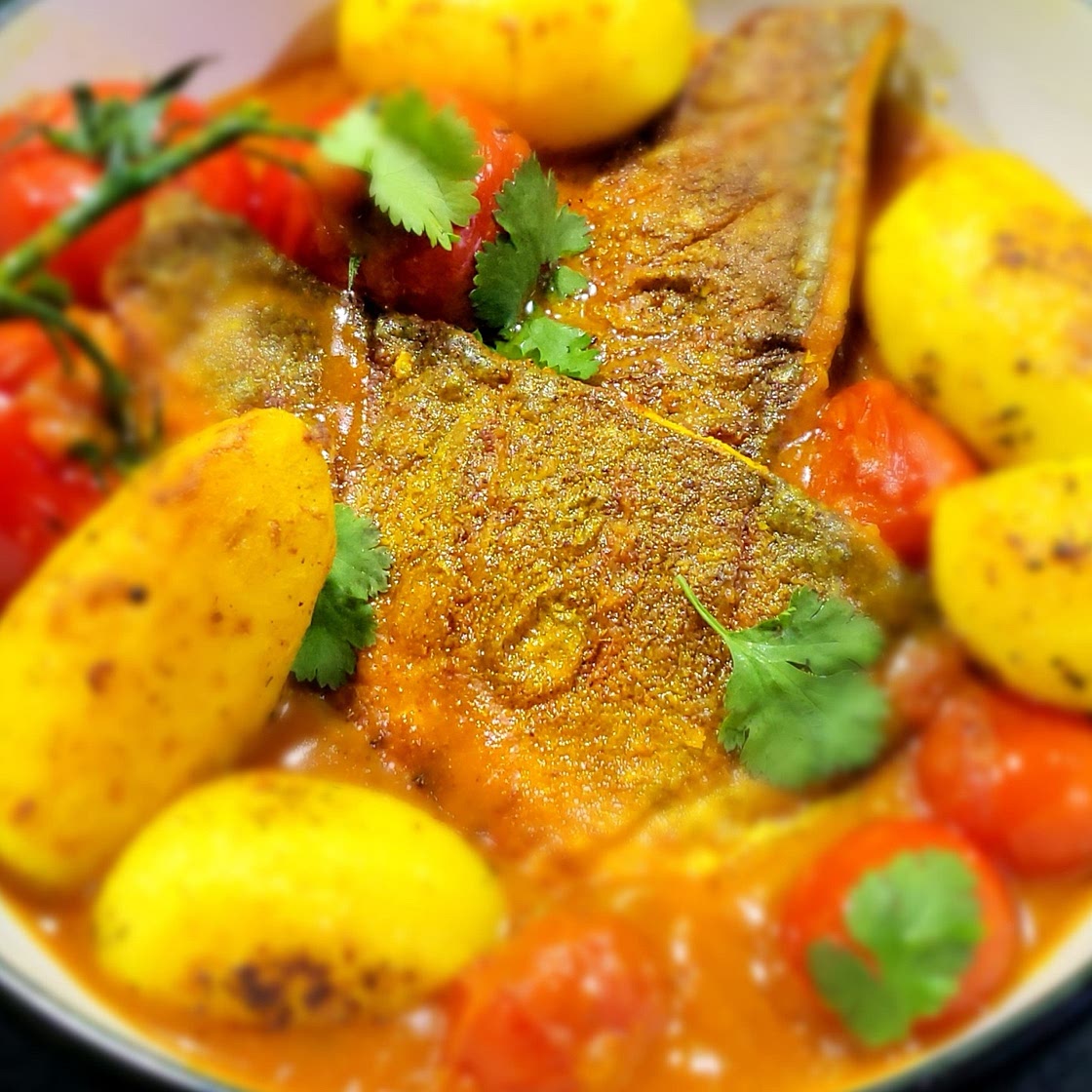Sea bass with Bengali fish broth