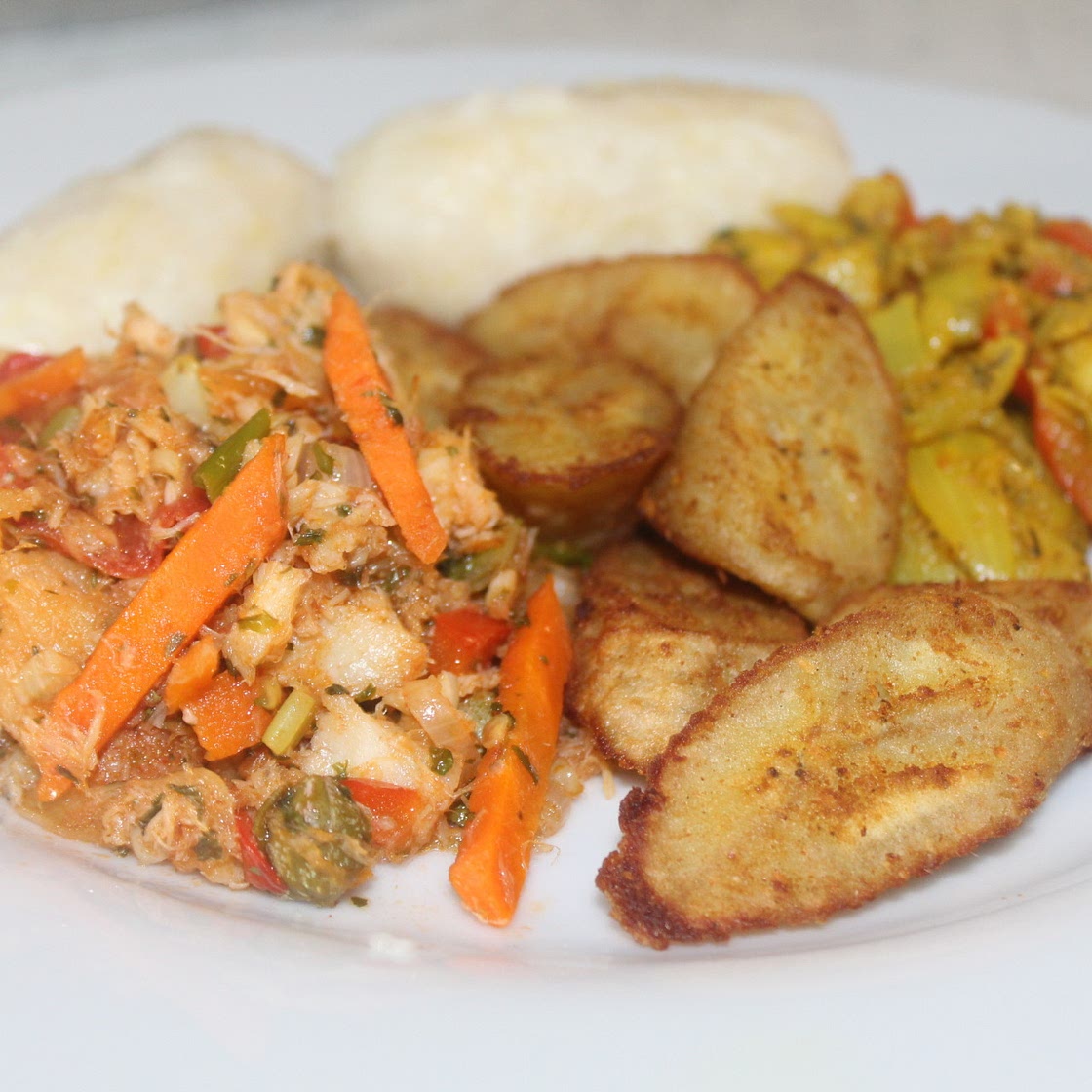 Stewed saltfish with spicy plantains and coconut dumplings