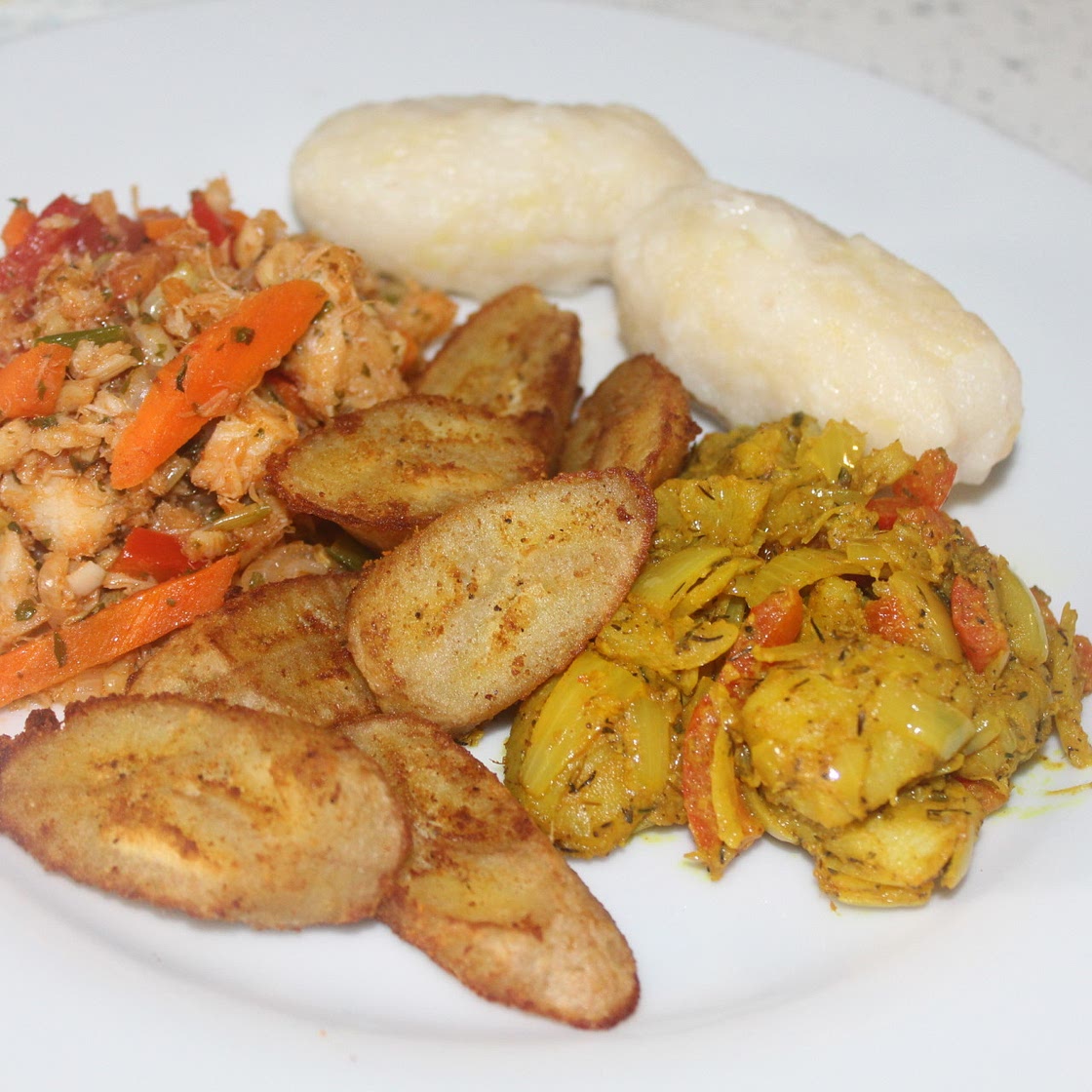 Stewed saltfish with spicy plantains and coconut dumplings