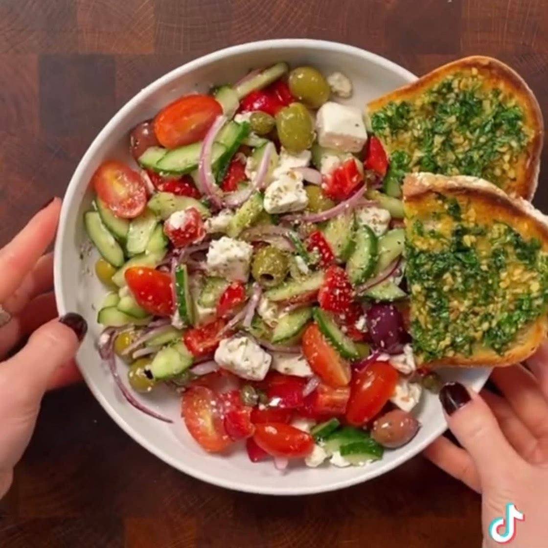 GREEK SALAD WITH OLIVE OIL GARLIC BREAD.