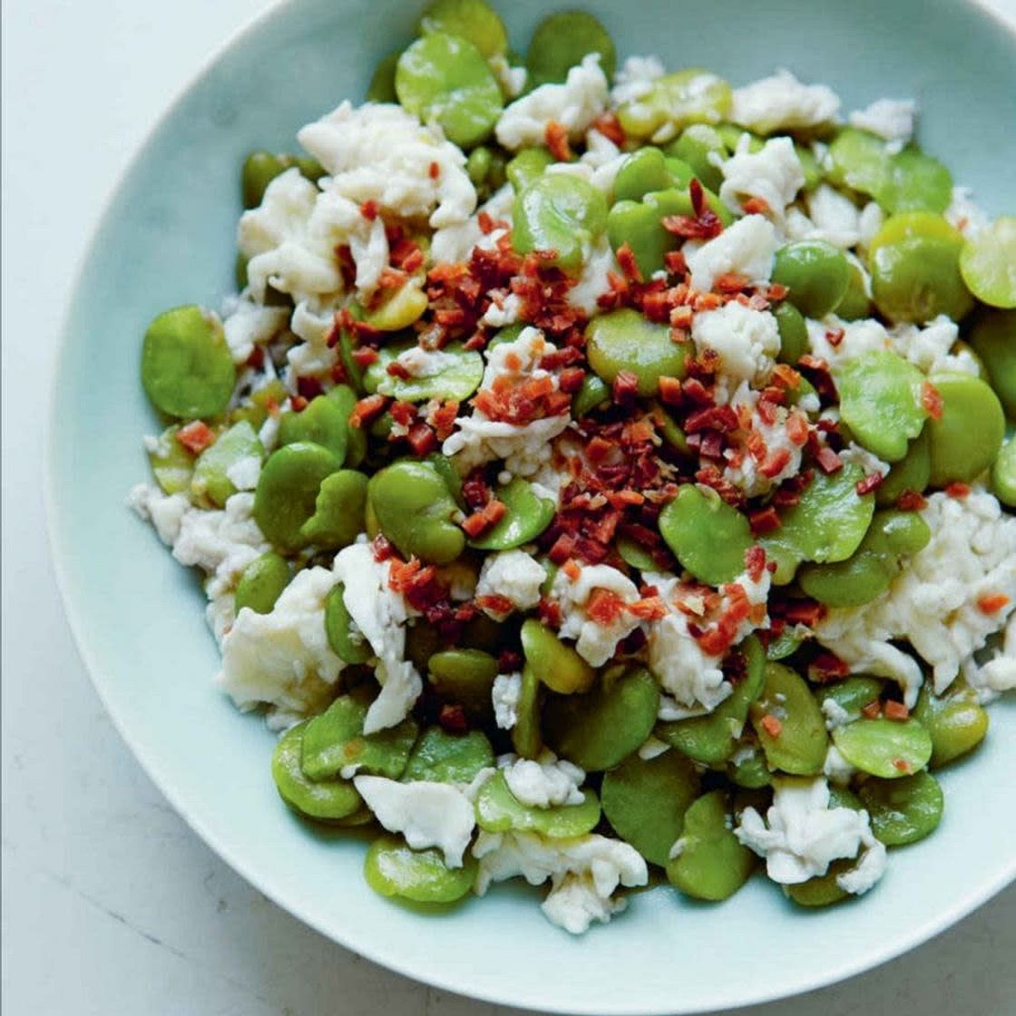 Hibiscus-blossom egg white with fresh fava beans