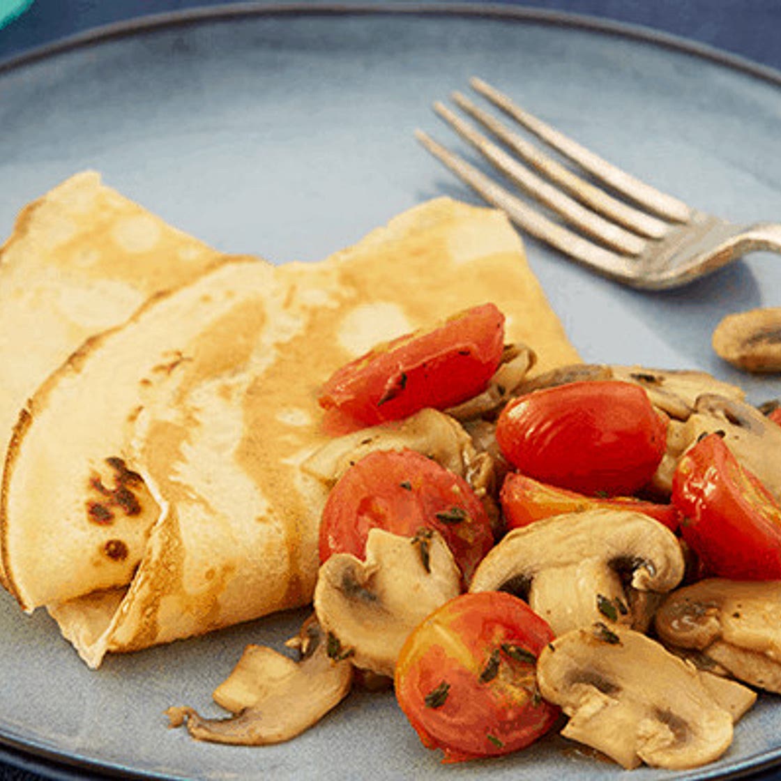Pancakes with tomatoes and mushrooms