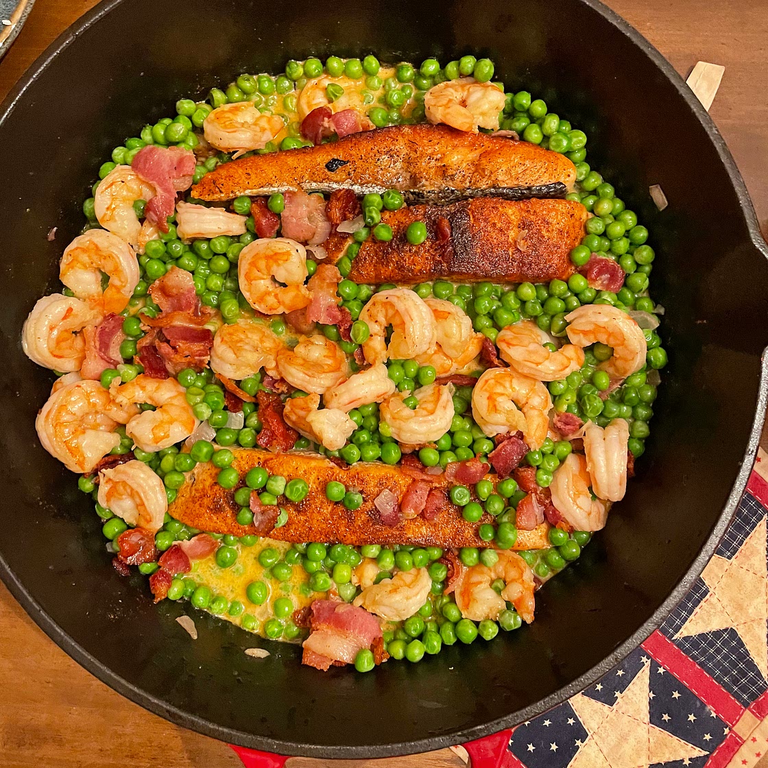 Blackened Salmon and Shrimp in a Butter Wine Sauce with Peas
