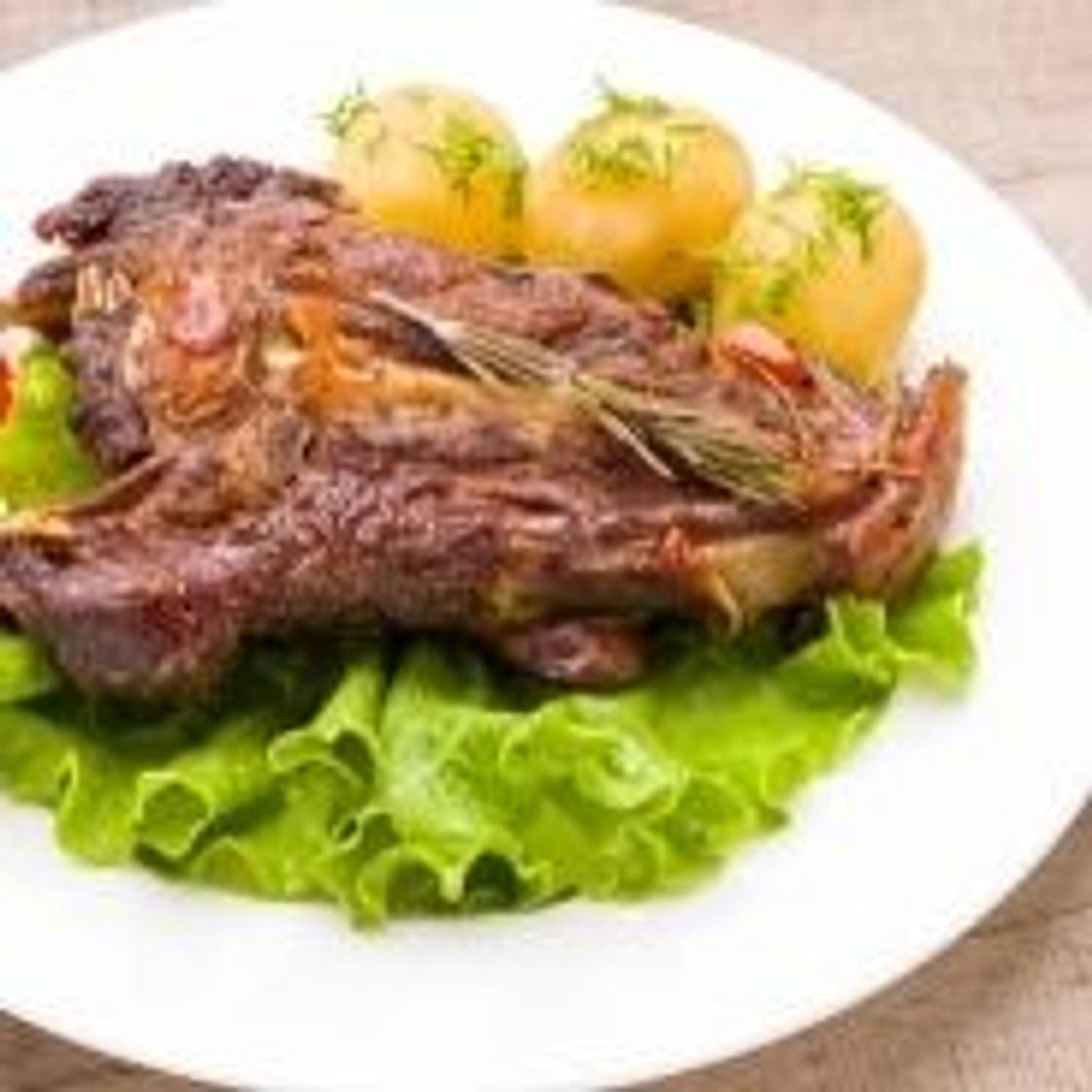 Lamb recipe with cumin couscous and fruits with honey