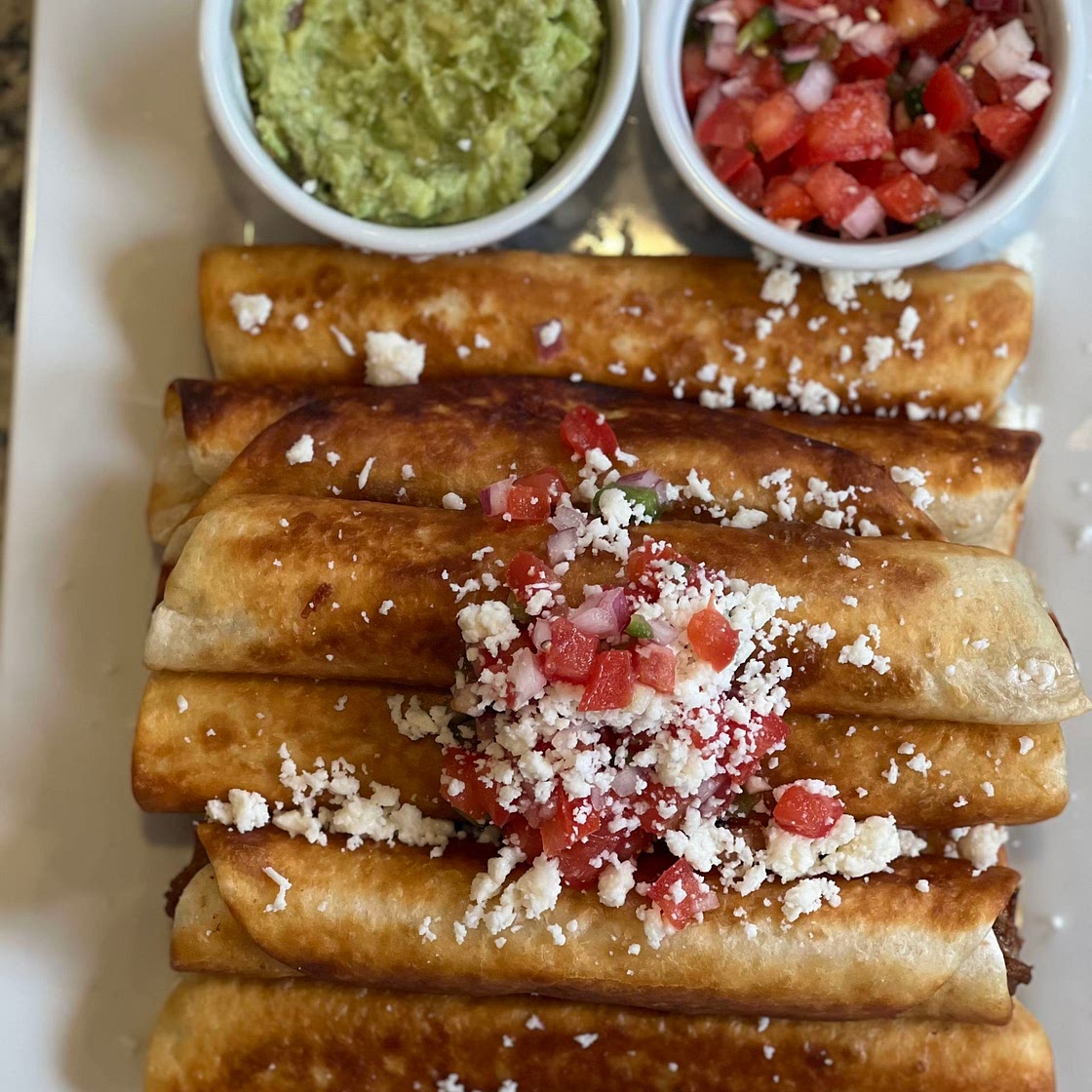 Cheesy Beef Taquitos 