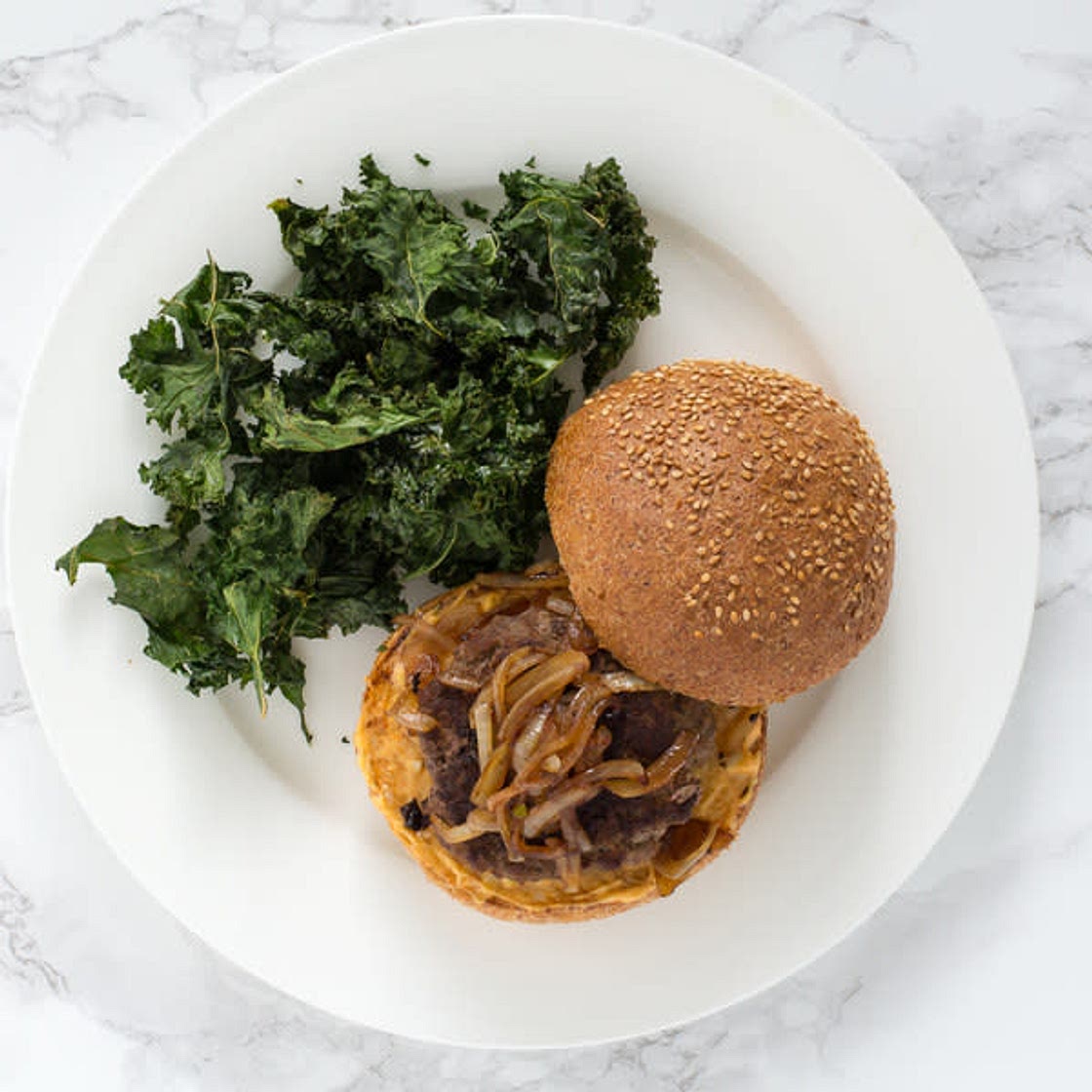 Beef Burgers with Paprika Mayo, Caramelized Onions & Kale Crisps