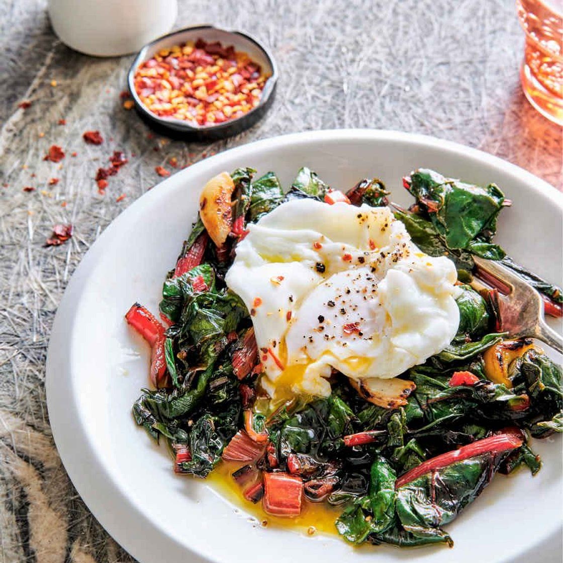 Poached egg and silky braised greens