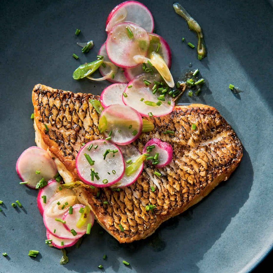 Crispy-skinned black sea bass with salt-and-butter radishes