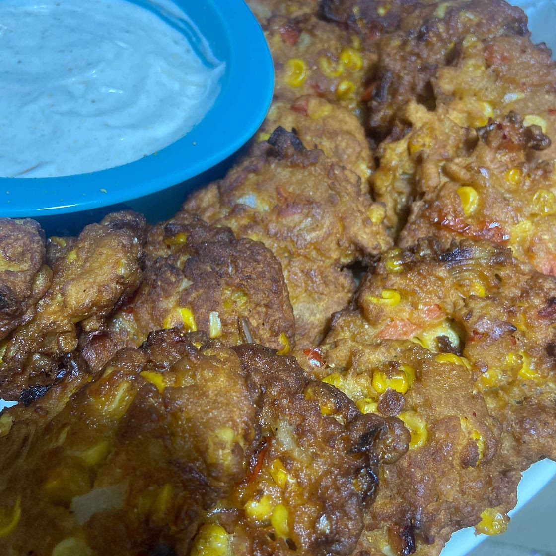 Corn fritters with a cilantro lime aioli