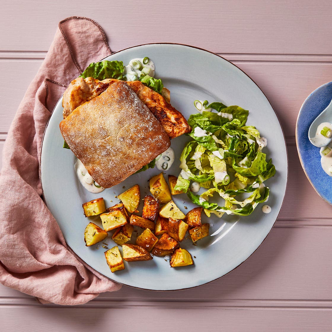 Spiced chicken ciabatta with herby potatoes 