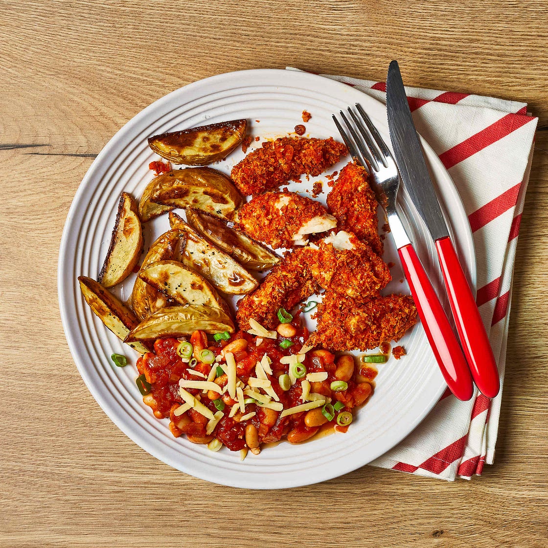 Homemade chicken goujons and cheesy beans