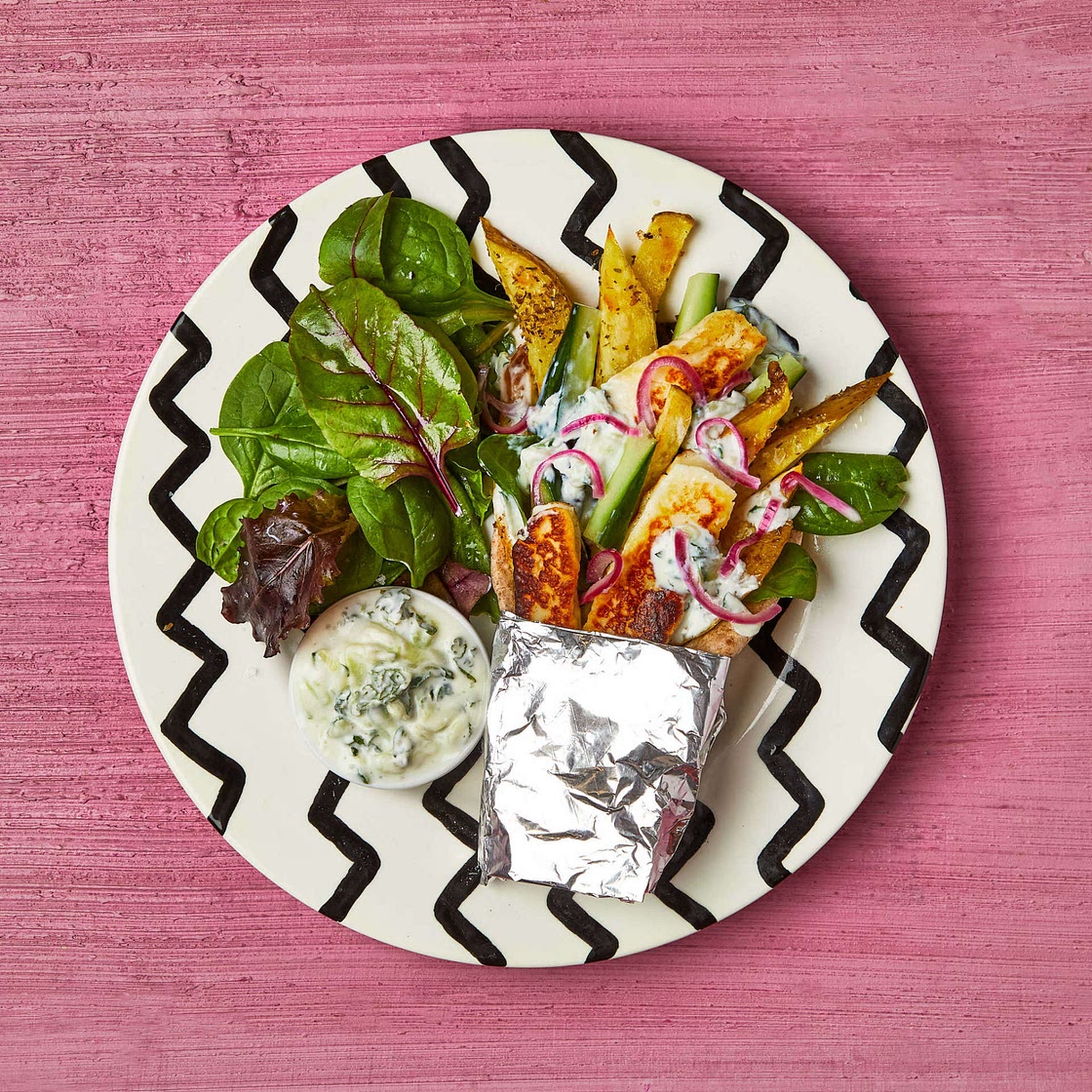 Halloumi, chip & tzatziki naan/ pitta wrap with salad