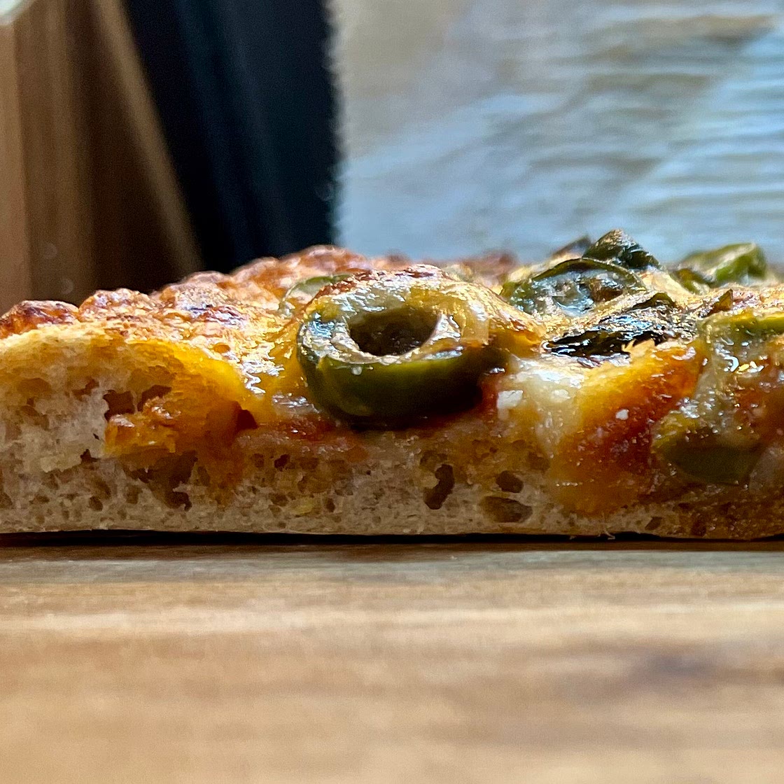 Sourdough Pizza with Olives and fresh Basil