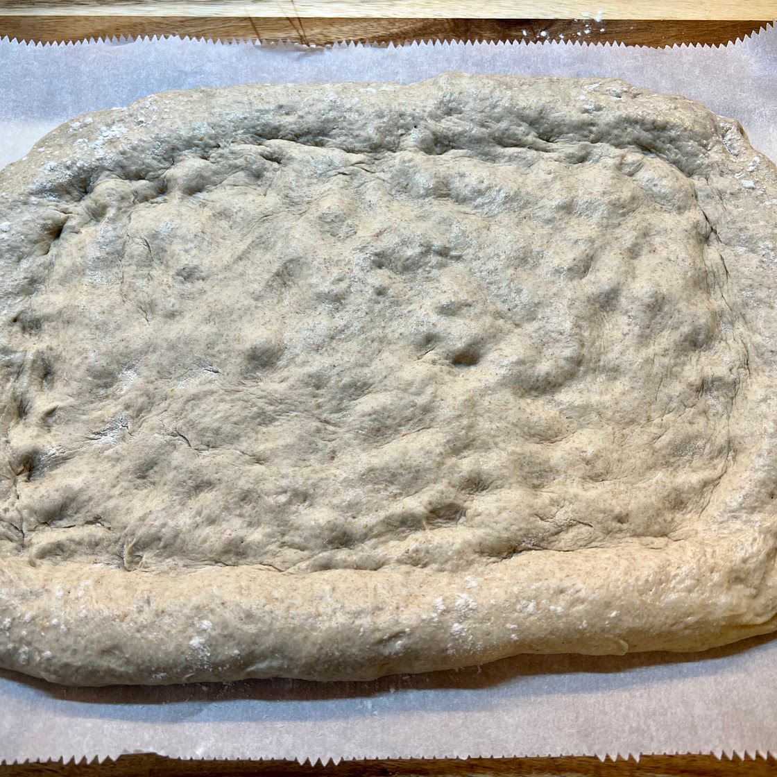 Sourdough Pizza with Olives and fresh Basil