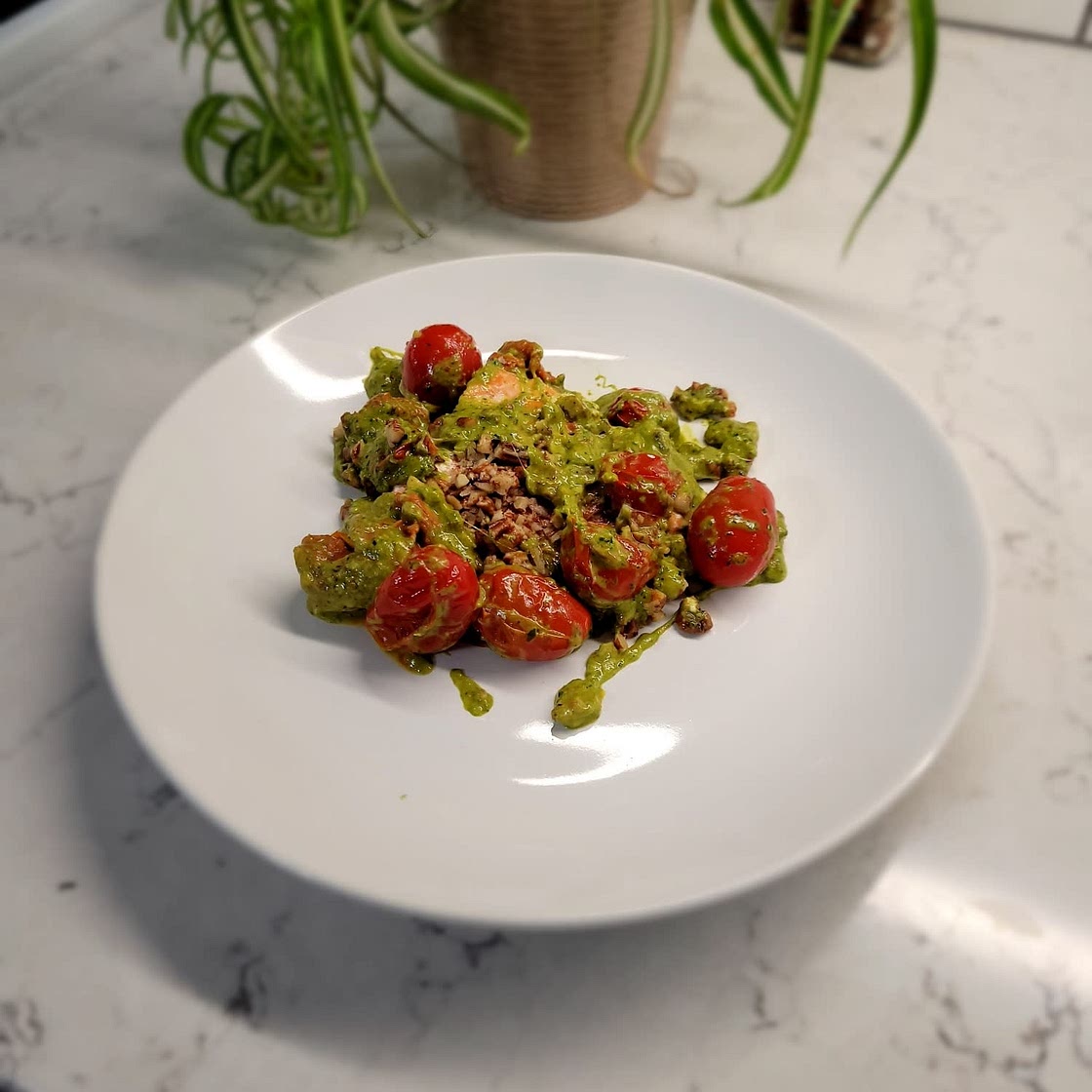 Creamy Pesto Salmon with Roasted Tomatoes and Pecans