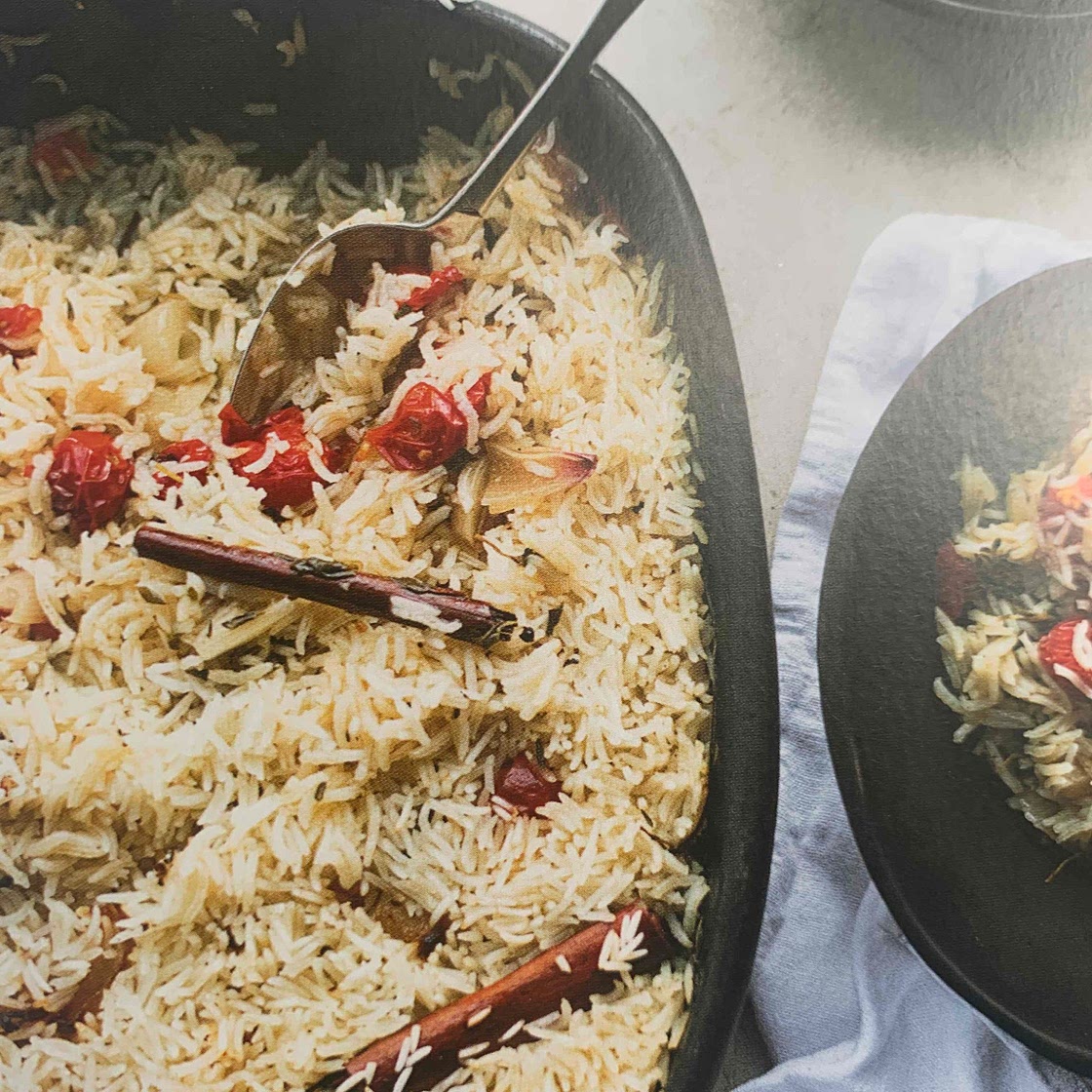 Baked rice with confit tomatoes and garlic 
