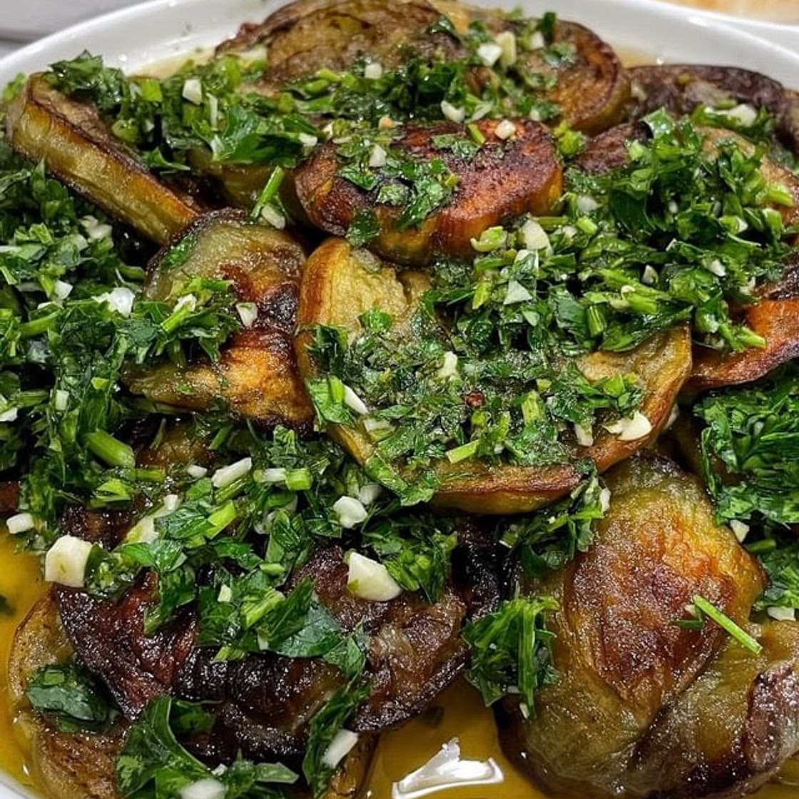 This is my favorite dish my husband makes! With such simple ingredients it’s crazy how much flavor is packed in this dish! I’ve made this myself plenty of times and it’s just not the same. Must be the secret ingredient! 2 eggplants 2 tablespoon salts 1 cup