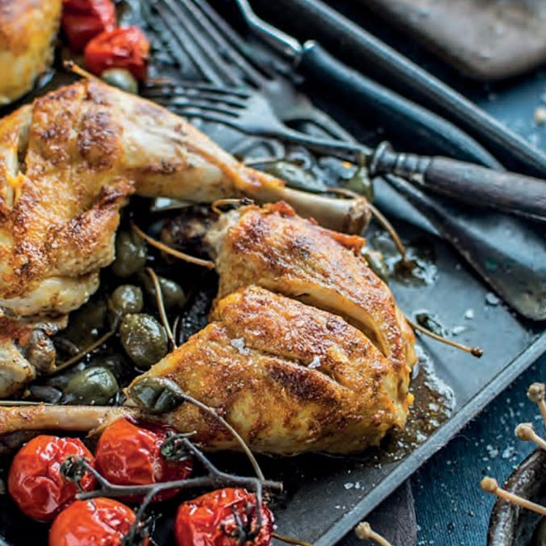 Oven roasted chicken legs with tomatoes