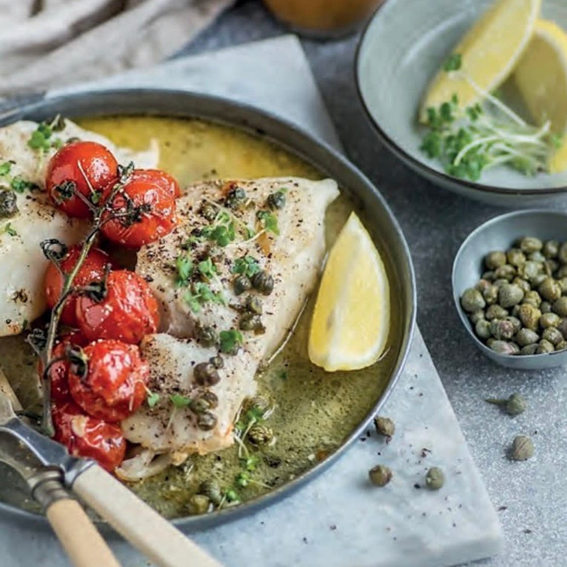 Baked haddock with tomatoes