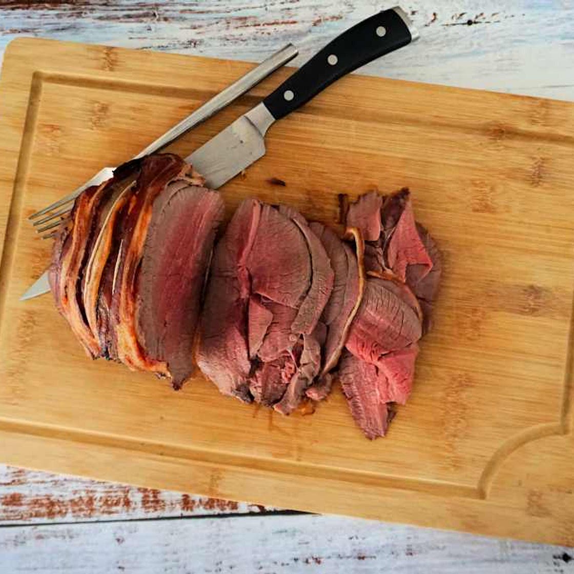 Slow cooked haunch of venison in a creamy cider and mustard sauce