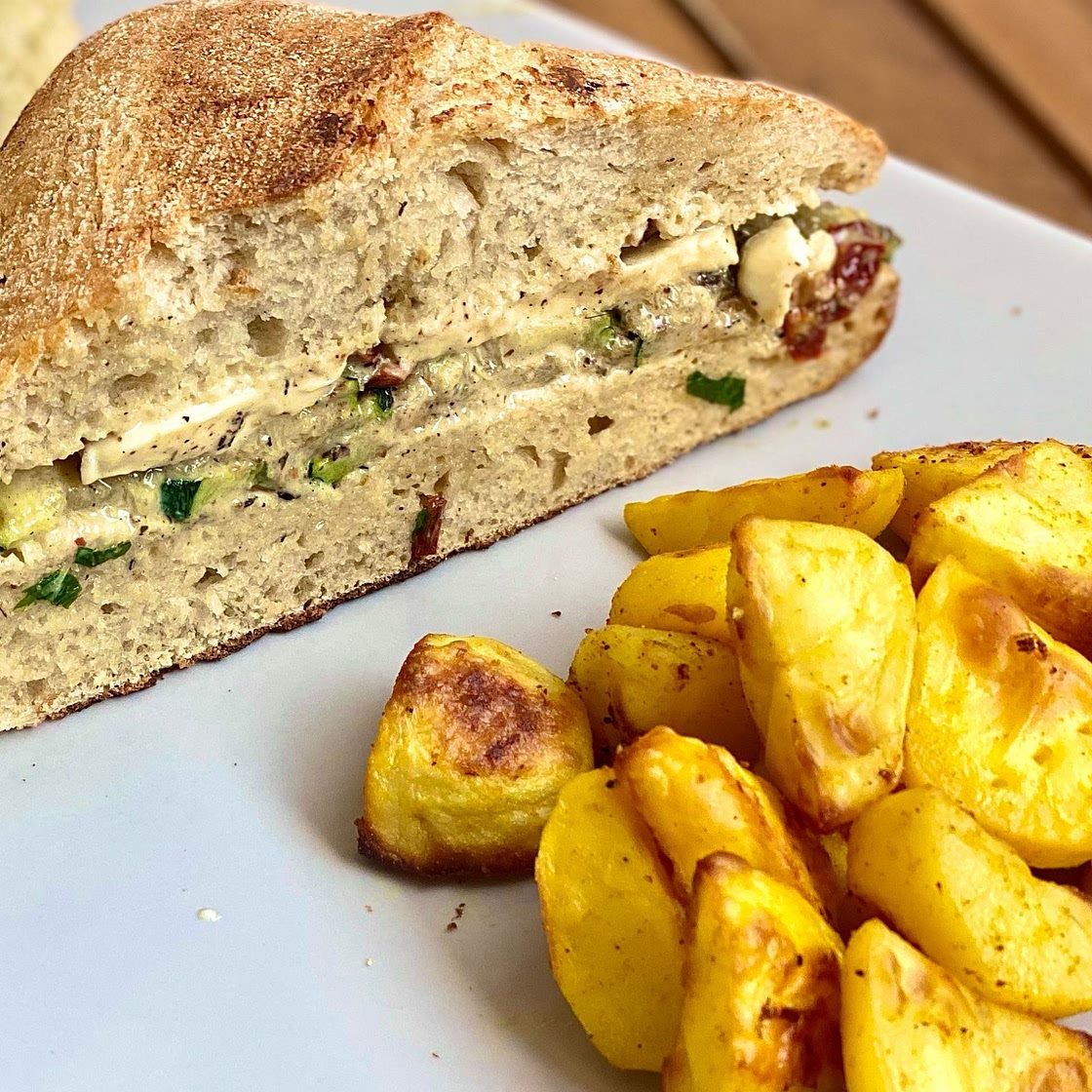 Zucchini, Mozz & Sun-Dried Tomato Panini with Herb Sauce & Italian-Seasoned Potato Wedges