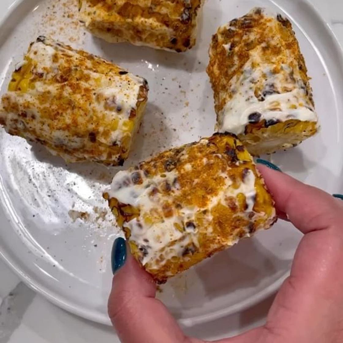 Elote Is this song stuck in anyone else’s head? Fresh or frozen corn on the cob 1/2 stick butter 1/2 cup milk 1 tbs salt 1 tbs mayo per corn cob Everything but the elote seasoning Place corn in a large pot and cover with water add butter milk and salt. Bri