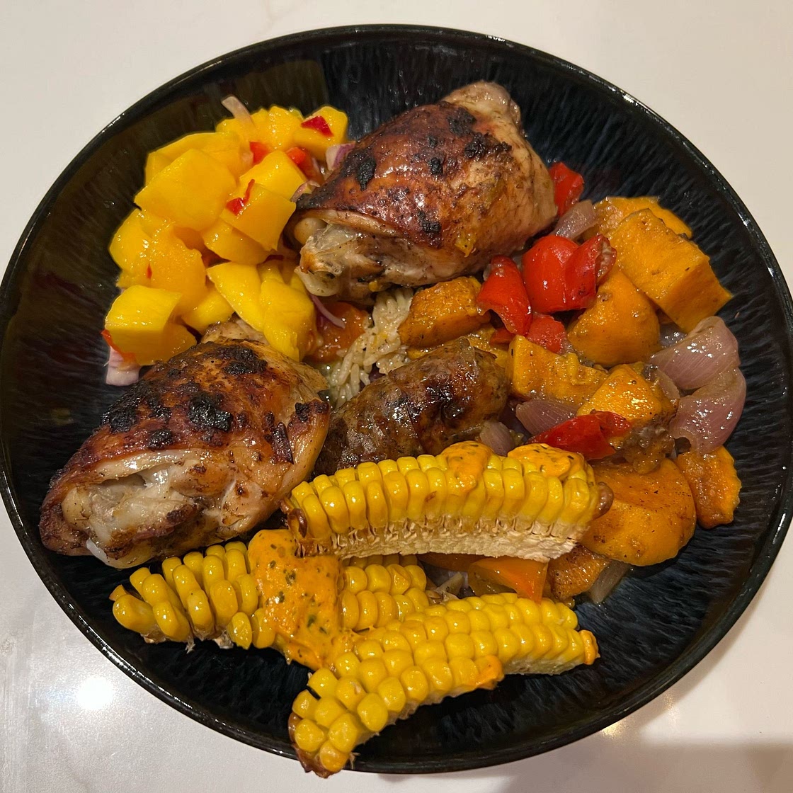 Jerk chicken & pineapple traybake