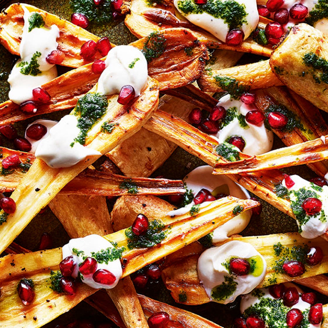 Roasted parsnips with tahini yoghurt sauce, herb oil and pomegranate…