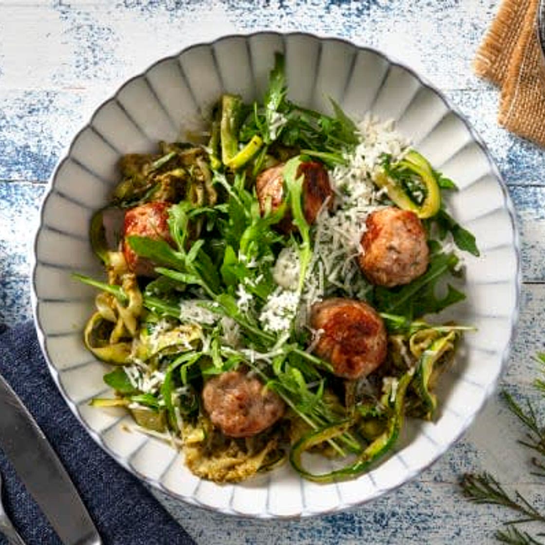 Herbed Pork Meatballs

with Pesto Courgetti and Parmigiano Reggiano