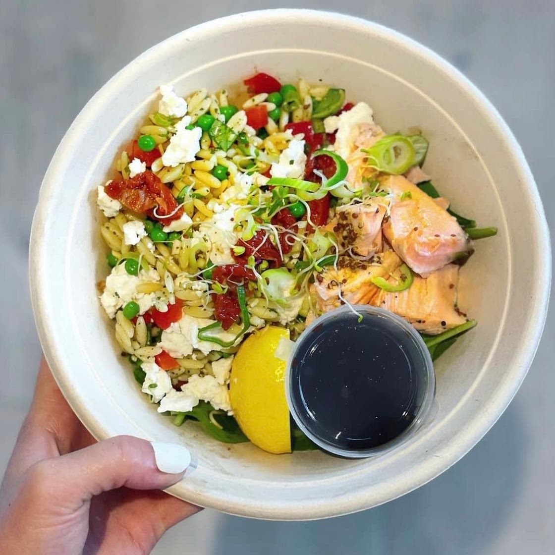 Orzo green pesto, baked salmon & sun-dried tomato