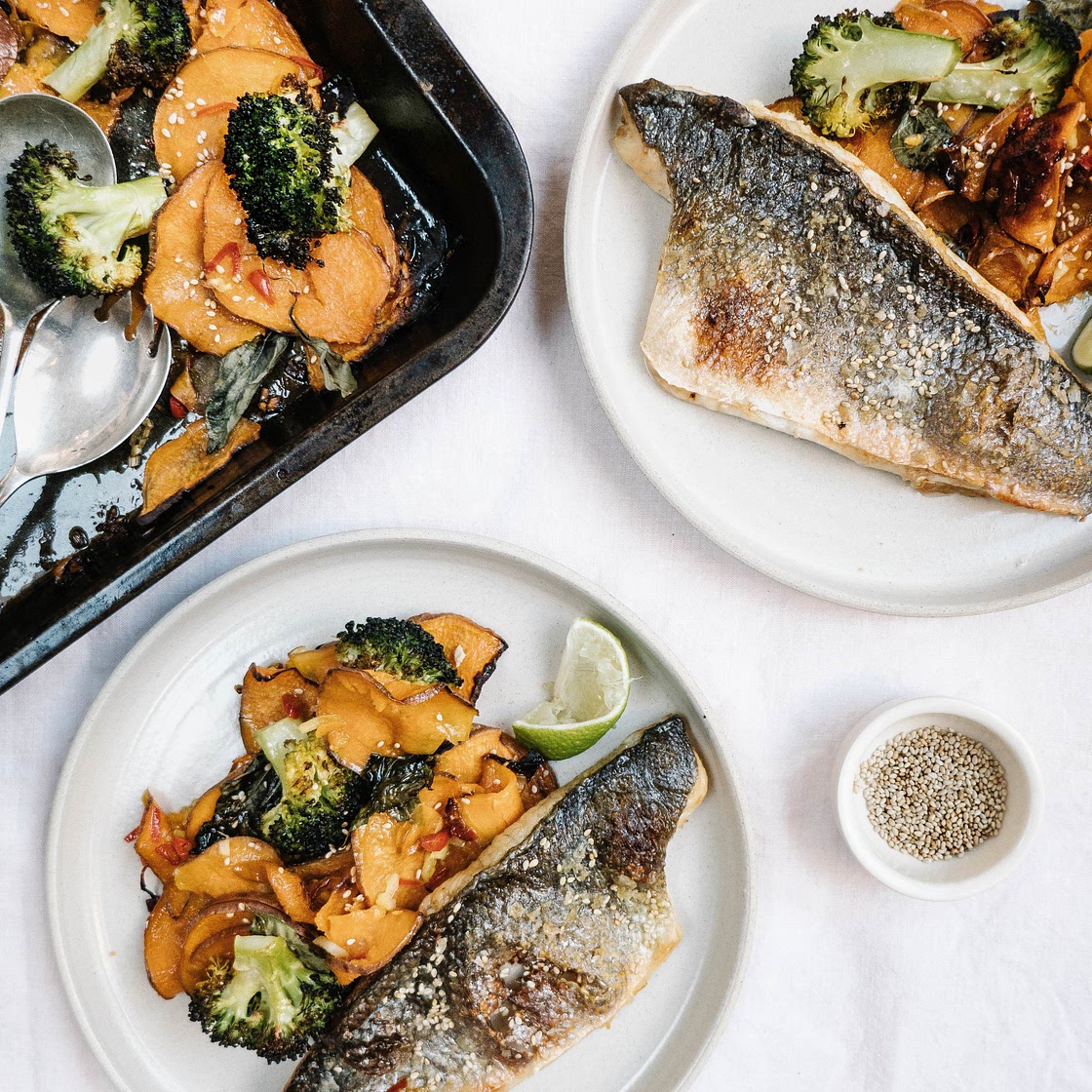 Aromatic sweet potato, broccoli and sea bass tray bake with sesame and lime — Alexandra Dudley