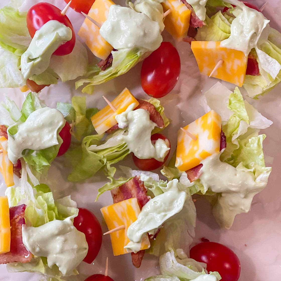 BLT bites with avocado crema 
