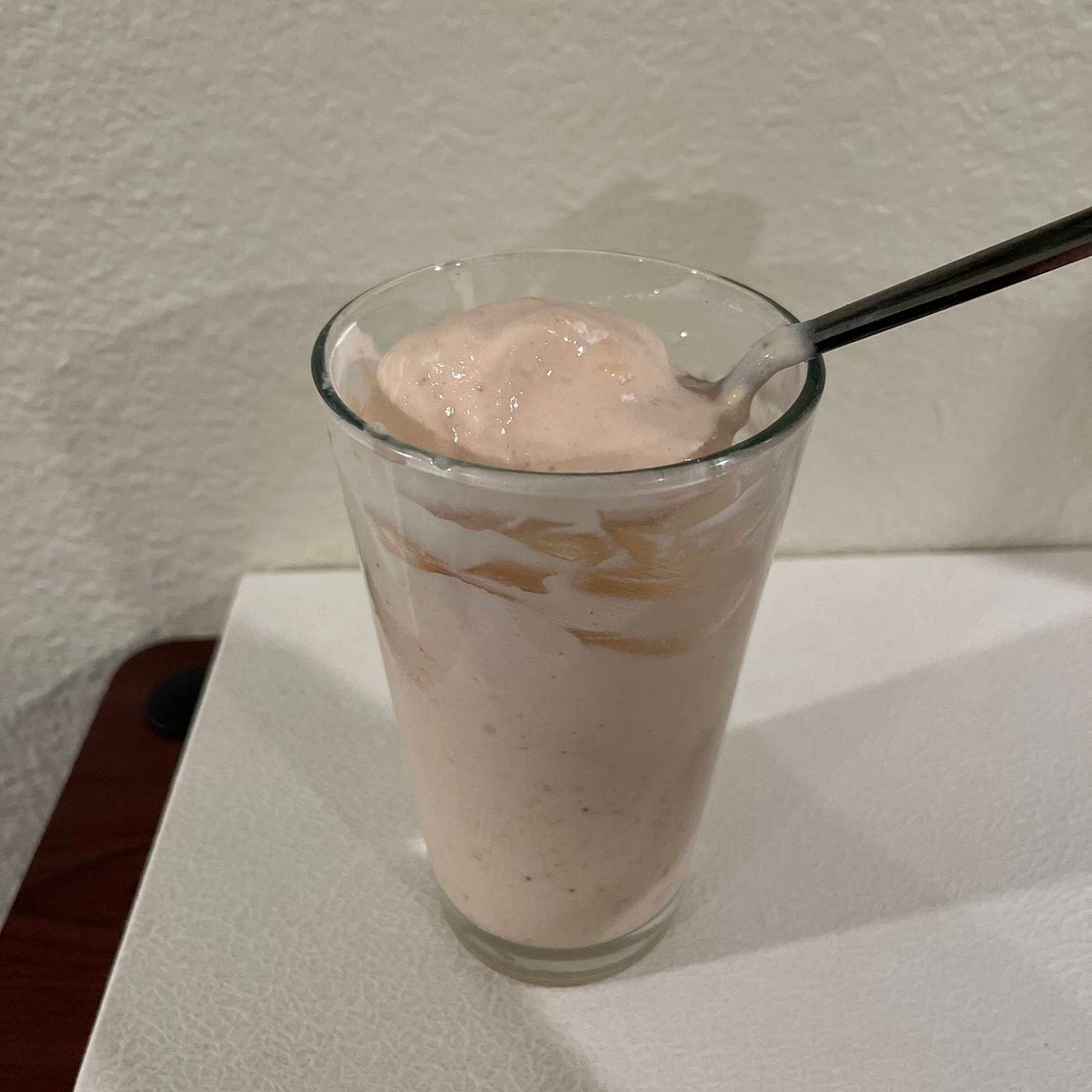 Mango, pineapple, strawberry, banana smoothie
