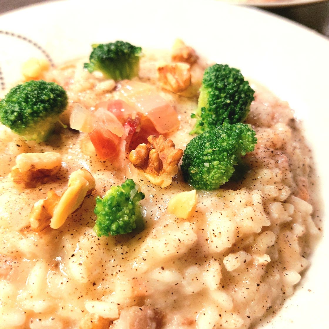 Risotto - Pecorino and cauliflower cream with pancetta, pepper and walnuts