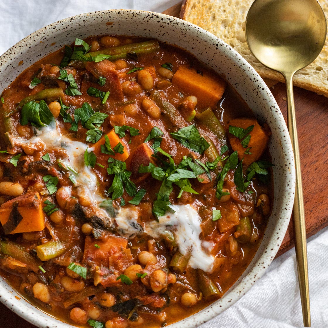Sweet Potato and White Bean Stew with Harissa and Tahini (vegan)