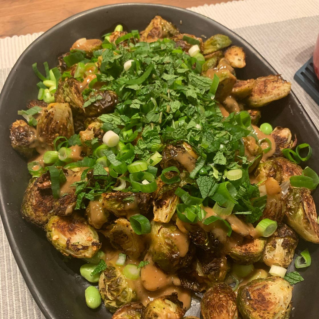 Crispy Roasted Brussels Sprouts with Edamame & Peanut Sauce