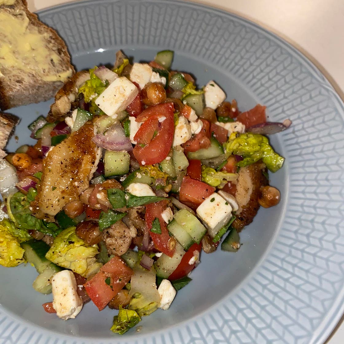 Greek inspired feta, chicken and tomato salad