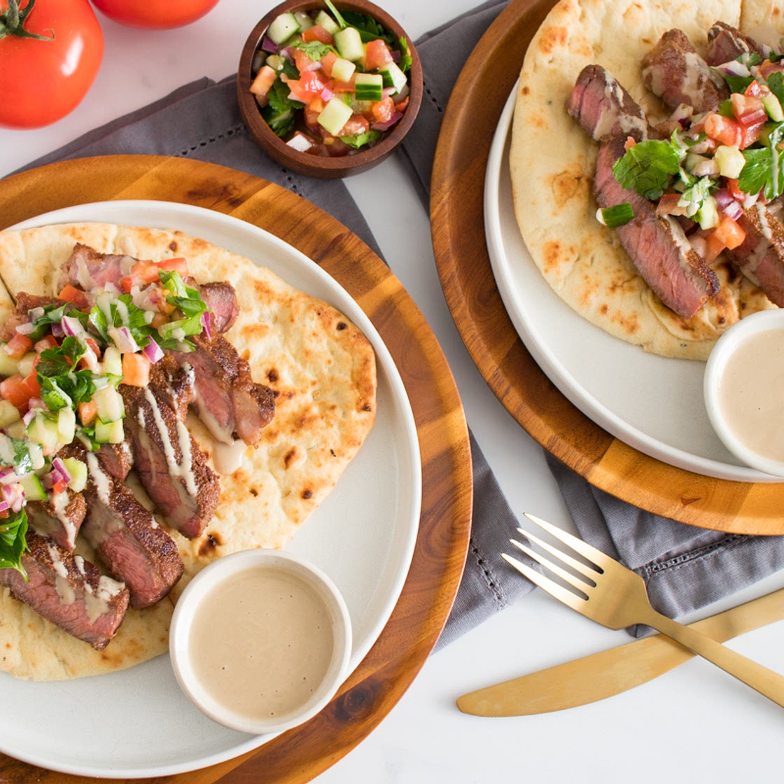 Cumin Steak Shawarma with Israeli Chop Salad and Tahini