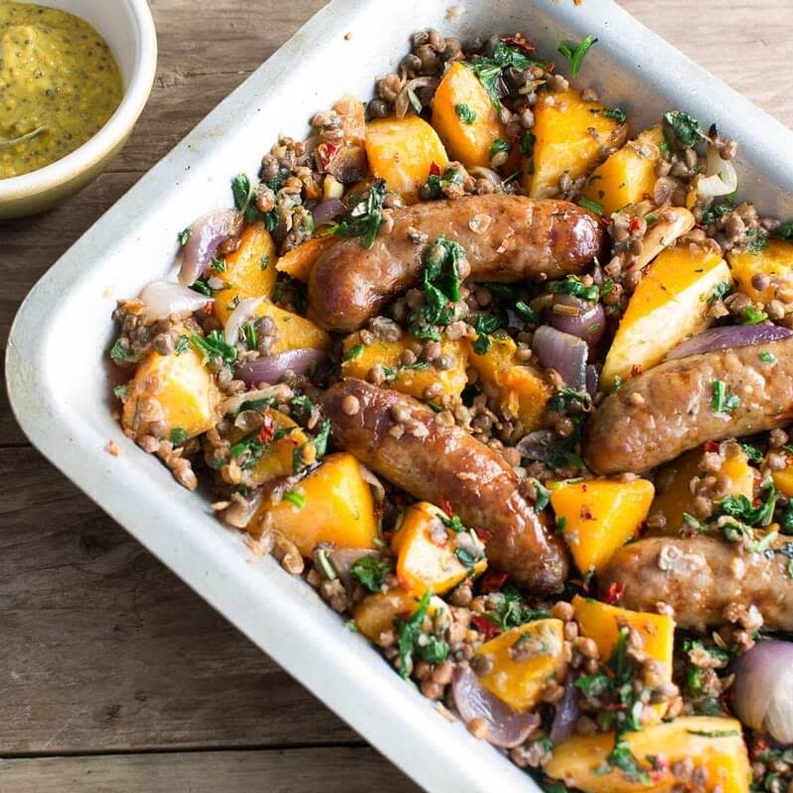 Sausage & squash bake with lentils, red onions, spinach & mustard