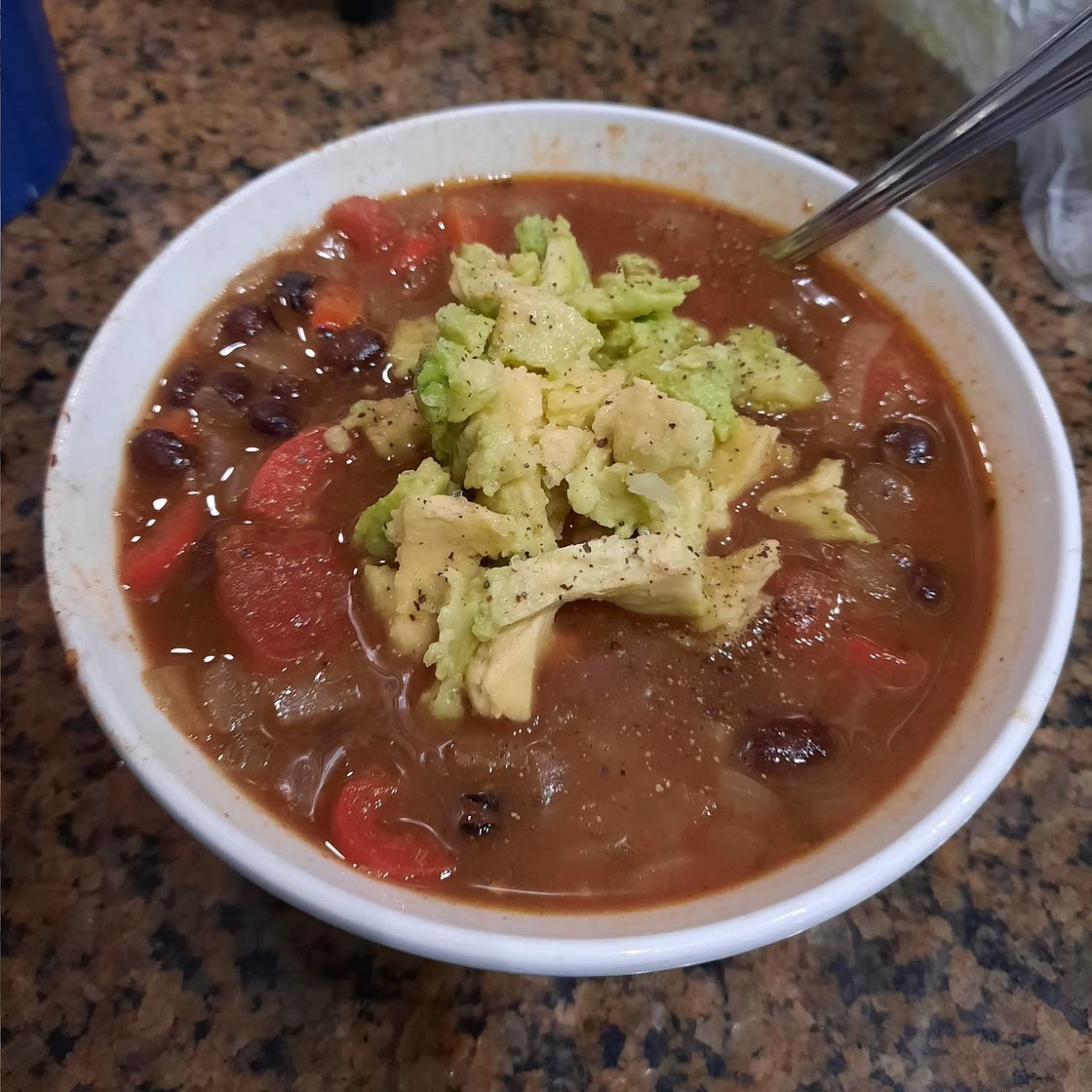 Mexican bean soup with guacamole