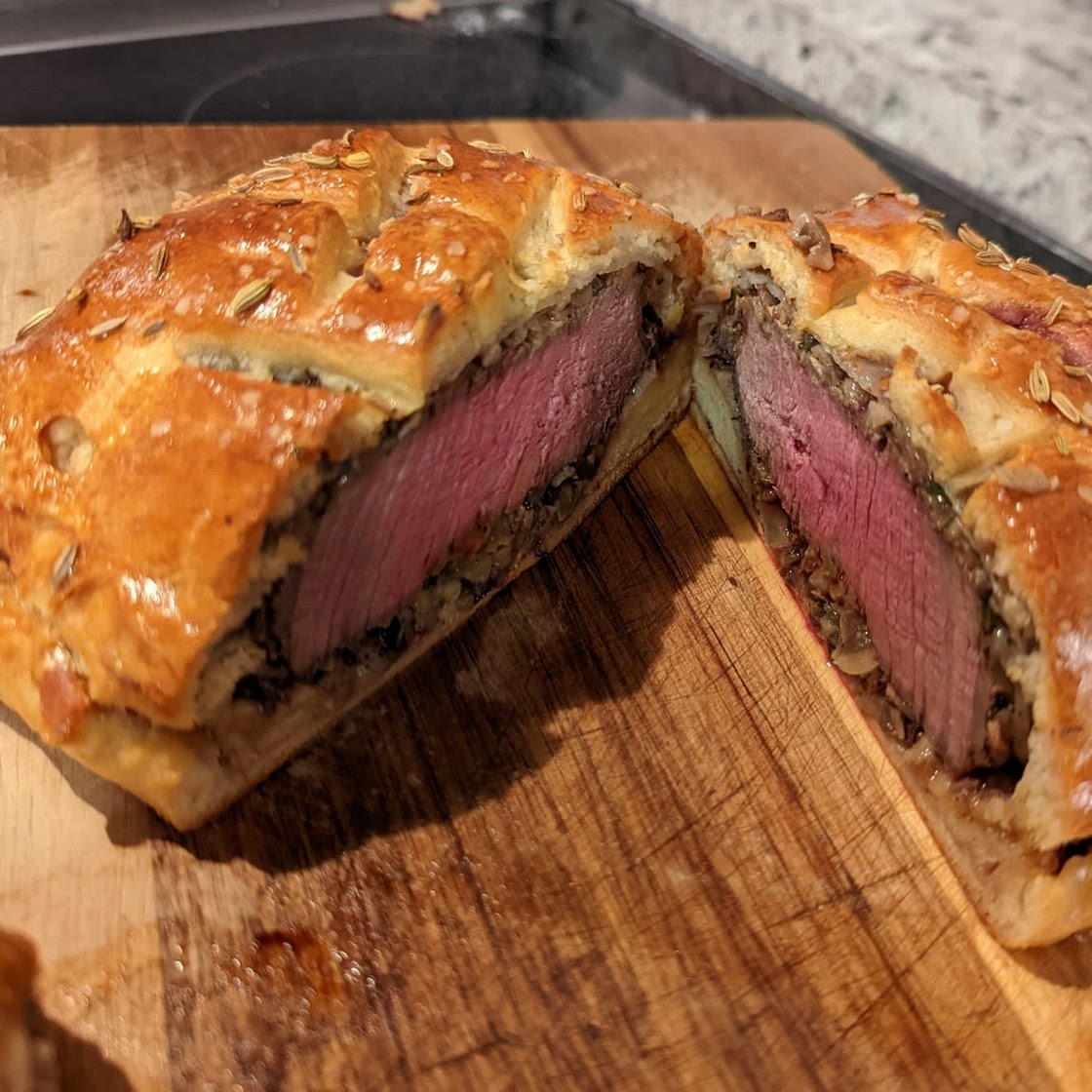 Beef Wellington Beef Tenderloin in Puff Pastry with Mushroom Duxelle and Prosciutto
