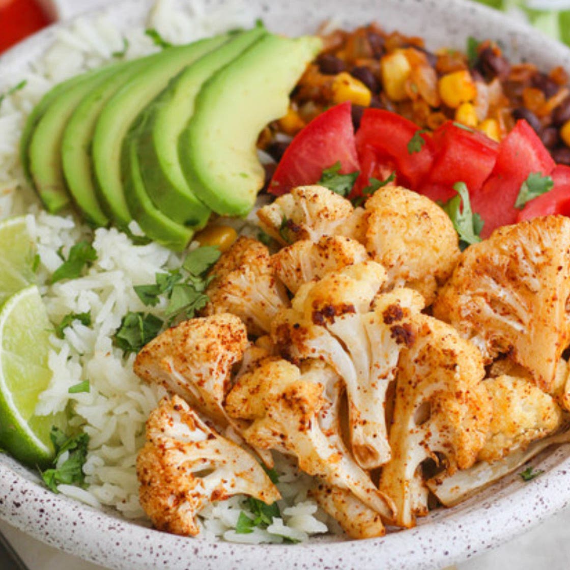 Roasted Cauliflower & Black Bean Burrito Bowl with Cilantro Lime Rice